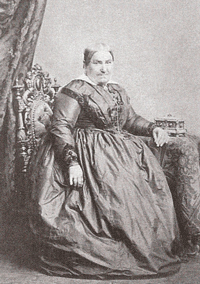 Das Paradebeispiel eines Münchner "Loambarons": Ziegeleibesitzer und Familienpatriarch Lorenz Seidl (1788 - 1880) aus Sachsenkam mit seiner dritten Ehefrau Anna geb. Brandner aus Bayrsoyen (1808 - 1865). Lorenz Seidl soll aus drei Eheverbindungen 24 legitime Kinder gehabt haben.